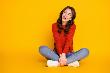 Full body photo of candid excited girl sit floor legs crossed look copyspace enjoy rejoice ads...