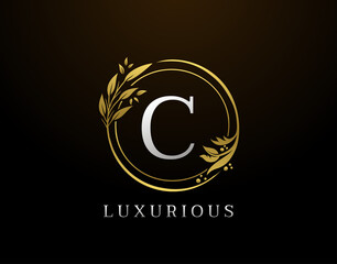 Fototapeta premium Elegant C Letter Floral Design. Circle Luxury C Gold Logo Icon.