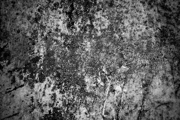 Grunge rusty metal texture background with old dirty black stain pattern on white damaged steel wall surface. Vintage rough iron metallic plate with rust detail