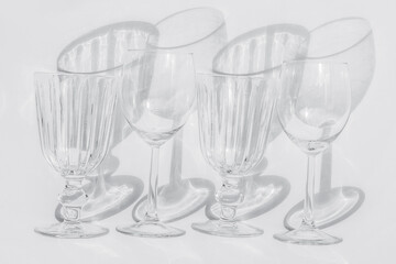 Four glasses on a white background.