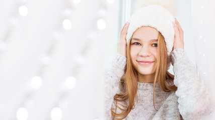 Merry Christmas and Happy Holidays! The morning before Christmas. Portrait of a beautiful girl