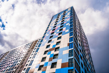 Multi-storey residential modern house against the sky. Residential area.