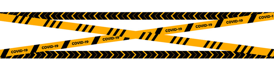 Covid-19 barrier warning tape on white,  black and yellow danger stripes stop spread of virus concept