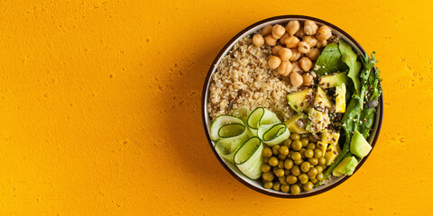 Healthy vegetable lunch from the Buddha bowl with quinoa, avocado, chickpeas. healthy food dish for vegetarians.