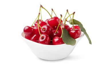 Ripe cherries in white bowl isolated on white background.