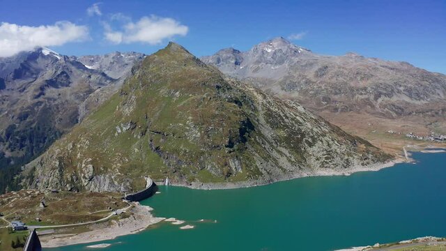 Aerial 4K - Montespluga, Italy, view of the lake towards the Swiss border