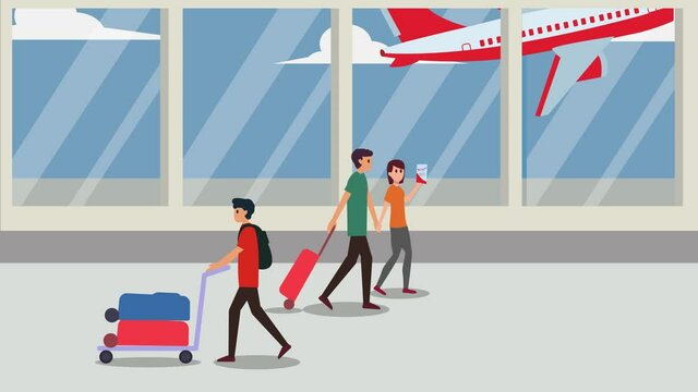 Group of passengers carrying luggage in the airport