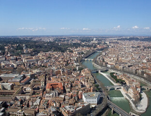 Obraz premium Aerial view along the Tiber River in the historic city of Rome Italy