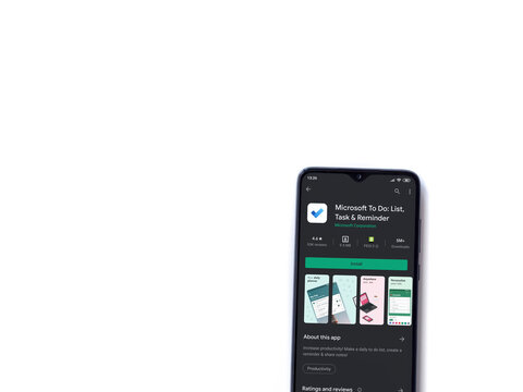 Lod, Israel - July 8, 2020: Microsoft To Do app play store page on the display of a black mobile smartphone isolated on white background. Top view flat lay with copy space.