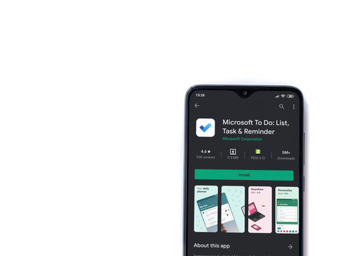 Lod, Israel - July 8, 2020: Microsoft To Do app play store page on the display of a black mobile smartphone isolated on white background. Top view flat lay with copy space.