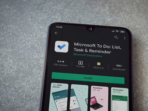 Lod, Israel - July 8, 2020: Microsoft To Do app play store page on the display of a black mobile smartphone on ceramic stone background. Top view flat lay with copy space.