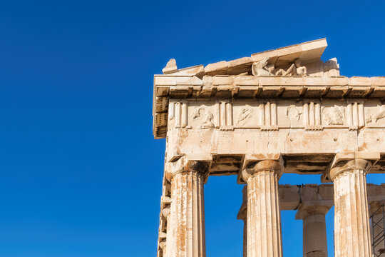 The Parthenon temple in the Acropolis of Athens against the blue sky, Greece.