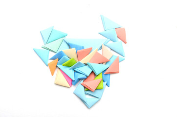 A heart origami folded objects on white