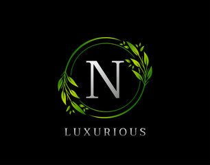 Elegant N Letter Green Floral Design. Circle Green Leaf N Logo Icon.