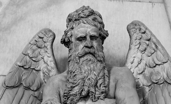Angel statue on a 1820 tomb located in an old Italian cemetery