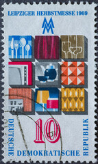 GERMANY, DDR - CIRCA 1969: a postage stamp from Germany, GDR showing layout of products in graphic...