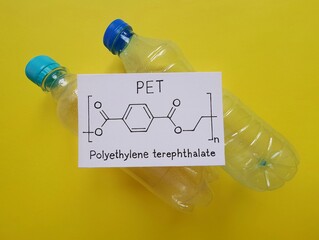 Structural chemical formula of polyethylene terephthalate molecule with plastic bottles made from...