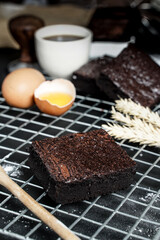 homemade chocolate brownies on grey background