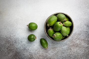 Tropical fruit feijoa in a bowl, top view. Healthy vegetarian food.