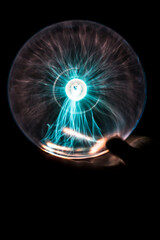 Hand Holding a Plasma Globe