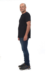 Fototapeta premium full portrait of a man side view and looking at camera on white background