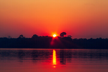 Sunrise on Amazon forest river