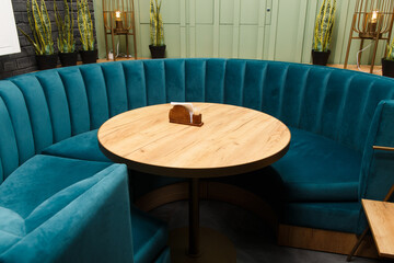 Large round sofa in blue for a large company
