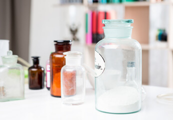Medical or experimental laboratory. Jars and bottles of chemicals.
