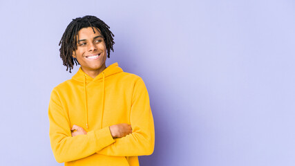 Young african american rasta man smiling confident with crossed arms.