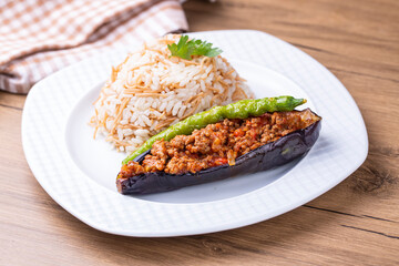 Turkish Traditional Aubergine Eggplant Meal - Karniyarik (Riven Belly) and rice