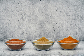 Spices and spices in glass saucers. Cooking and kitchen.
