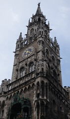 Fototapeta na wymiar Clock Tower or Glockenspiel of Rathaus (New Town Hall) on Marienplatz square, Munich, Bavaria, Germany. It is old landmark of Munich.