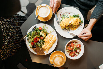 delicious breakfast of scrambled eggs and oatmeal at cafe