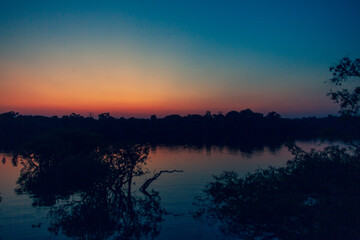 Sunrise on Amazon forest river