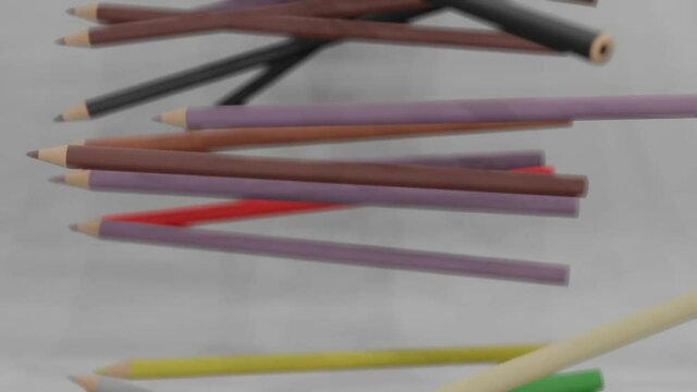 Mixed colored pencils are falling with white background (3D Rendering)