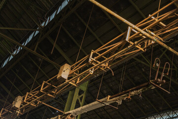 Overhead gantry in an abandoned warehouse.