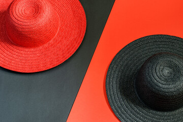 Red hat lady on the blacck background, black hat lady on the red background. Fashionable lady hats, lifestyle concept.
