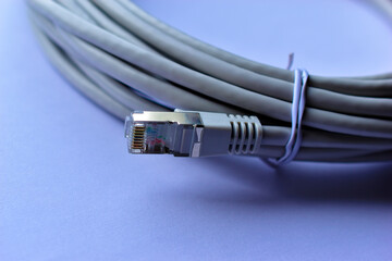 LAN cable patch cord white cord on white background