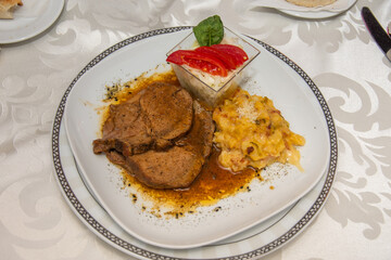 grilled pork with cabbage and tomatoes