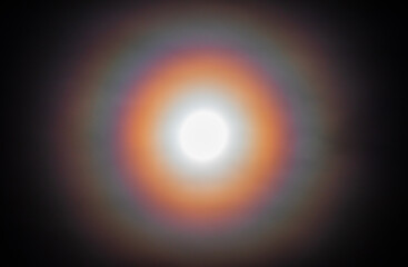 Colorful Moon Halo. Rings Around the Full Moon
