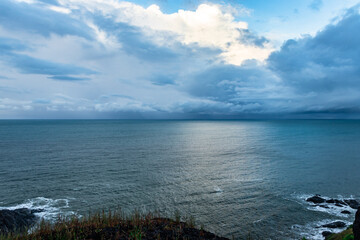 sea horizon view with dramatic cloud from mountain top
