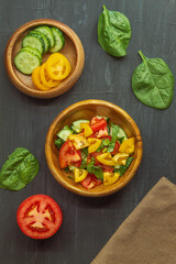 View from the top of fresh tomato, cucumber and spinach salad