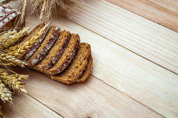 Rye bread. Bakery with crusty loaves and crumbs. Fresh loaf of rustic traditional bread with wheat...