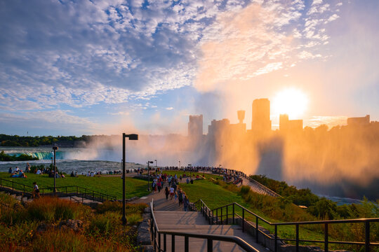 Terrapin Point in Niagara Falls, New York, USA, with sunset view over Niagara River and Cityscape of Niagara Falls, Ontario, Canada
