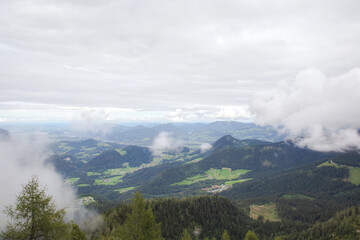 Majestic view on beautiful fog mountains in mist landscape. Dramatic Travel background.