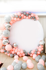 Close up the photo zone from pink and grey balloons with white copy space for your text.