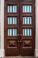 Obraz na płótnie Canvas aged old door from wood. Locked vintage door