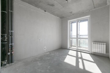 interior of the apartment without decoration in gray colors