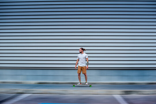 A Boy riding a skateboard