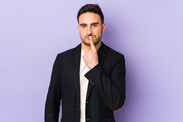 Young caucasian man isolated on purple background thinking and looking up, being reflective, contemplating, having a fantasy.